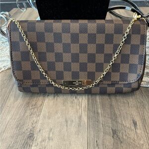 Brown checkered clutch